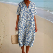 Lola - Vestido de Marfil Adornado con Acentos Florales en Azul Porcelana