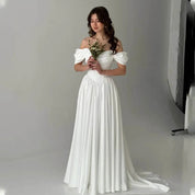 Nerea | Vestido Maxi Off-Shoulder con Drapeado en el Busto y Falda Plisada