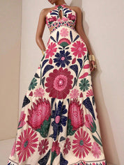 Isabel | Vestido Maxi Halter con Estampado Floral Folk y Cut-Out en la Cintura