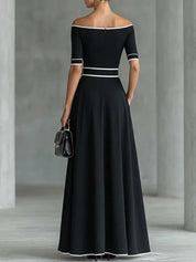 Isabel | Vestido Maxi Off-Shoulder Negro con Cinturón Dorado y Abertura Lateral